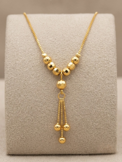 Sleek Gold Tone Lariat Drop Necklace